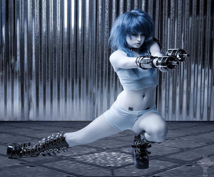 Deven Skye in a blue-haired action pose