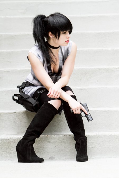 Deven Skye in a gothic look on white steps